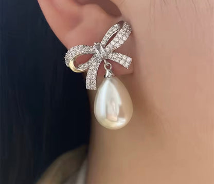 Silver Bow Pearl Earrings