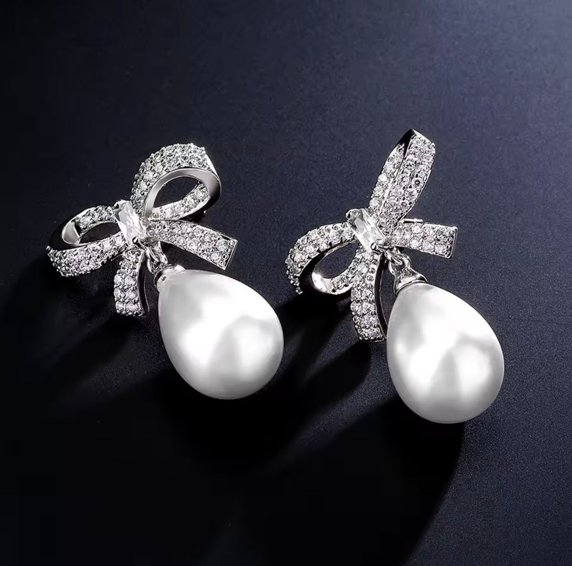 Silver Bow Pearl Earrings